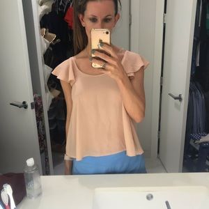 Blush pink sleeveless blouse